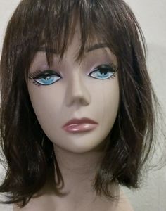 New wig. Never worn. May be human=synthetic blend.